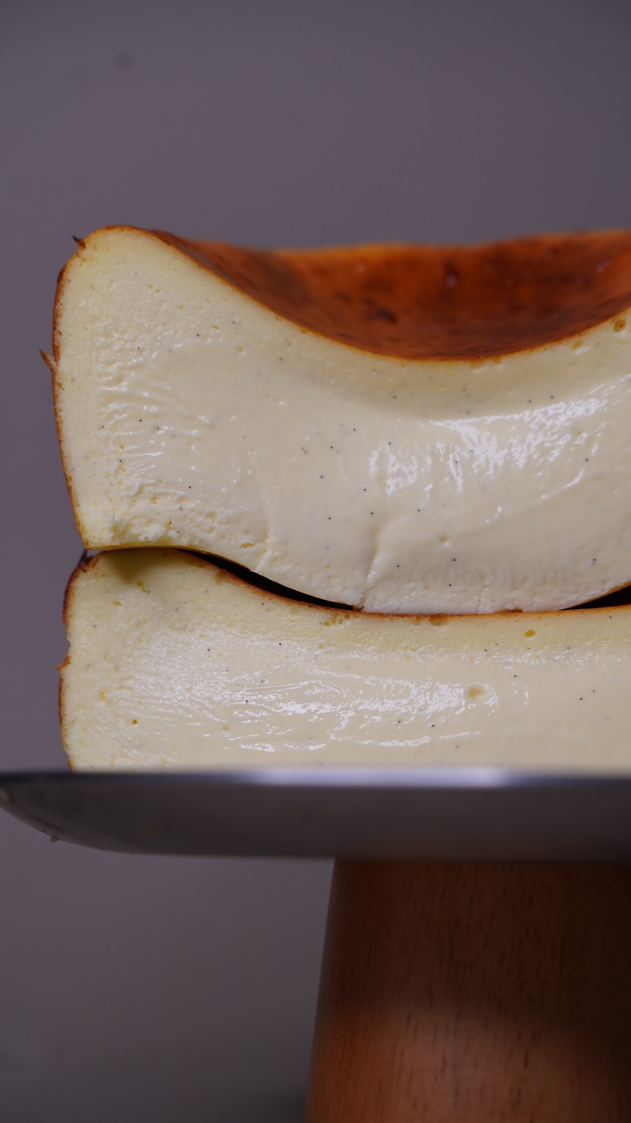 A close view of the creamy centre and caramelised top of a Basque cheesecake